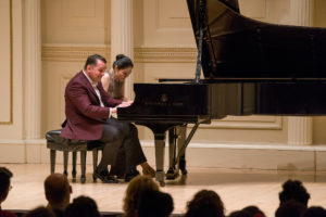 Mai Kagaya & Alexander Beridze playing four hands for piano at the New York Music Foundation 10th Anniversary Gala at the Carnegie Hall (Photograph: © 2019 Richard Termine. Photo Credit - Richard Termine)
