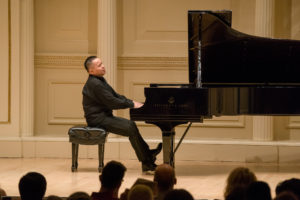 Dizhou Zhao (piano) playing a piece at the New York Music Foundation 10th Anniversary Gala at the Carnegie Hall (Photograph: © 2019 Richard Termine. Photo Credit - Richard Termine)